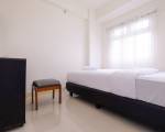 2 Bedrooms at Green Pramuka City Apartment By Travelio